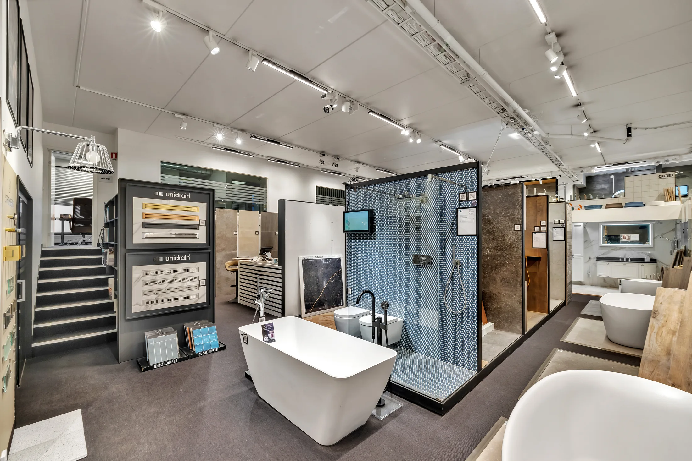 The showroom with bathroom solutions and tile walls